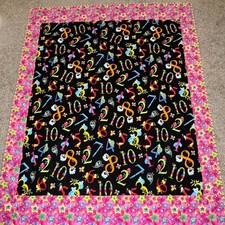 Handmade bright BABY QUILT featuring numbers fabric pink stars stripes blanket