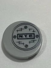 LEGO® 14769pb008 Tile, Round 2 x 2 Bottom Stud Holder with 'N.Y.C.' and Manhole