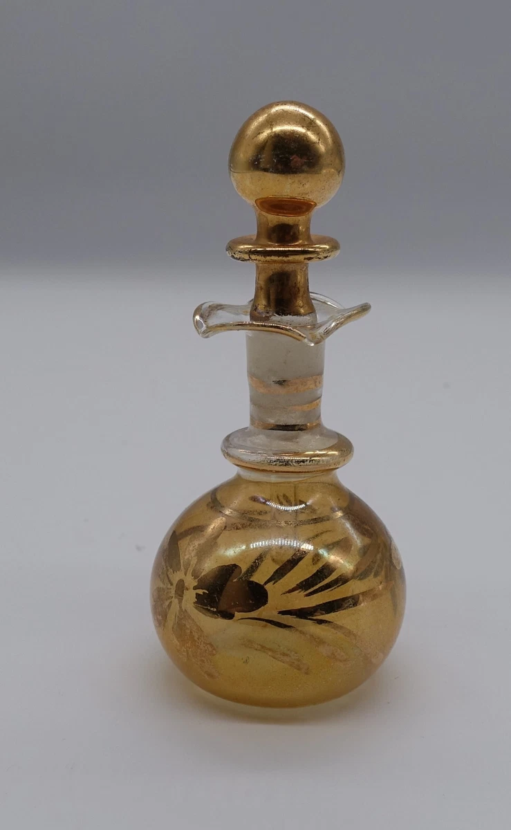 small gold perfume bottle