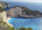 Ansichtskarte: versteckter Strand in einer Felsenbucht - hidden Paradise beach