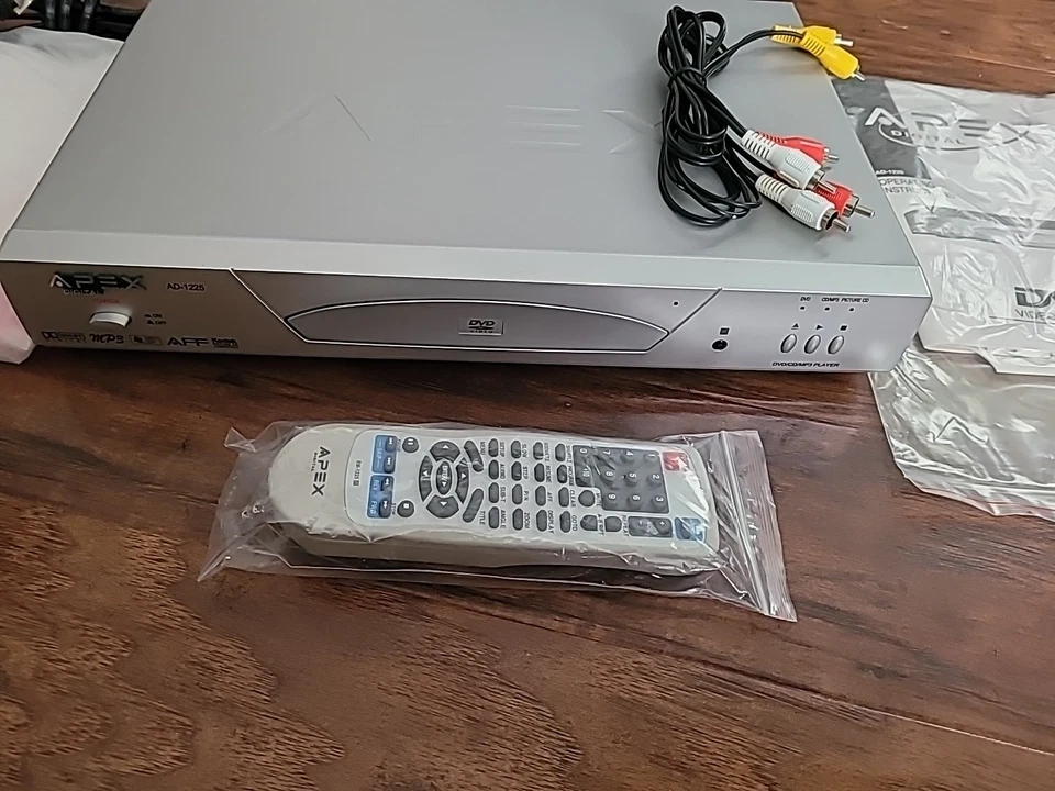 Reproductor de video DVD Apex Digital Silver AD-1225 con instrucciones cables AV y control remoto Foto 2 de 4