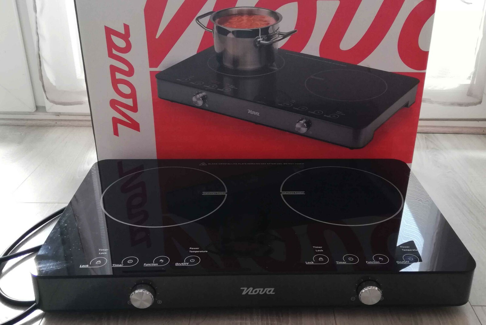 Table induction 2 foyers 3100 Watts noire facile à nettoyer
