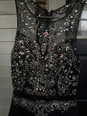 Black dress, medium, short, pretty just not my style, never worn.