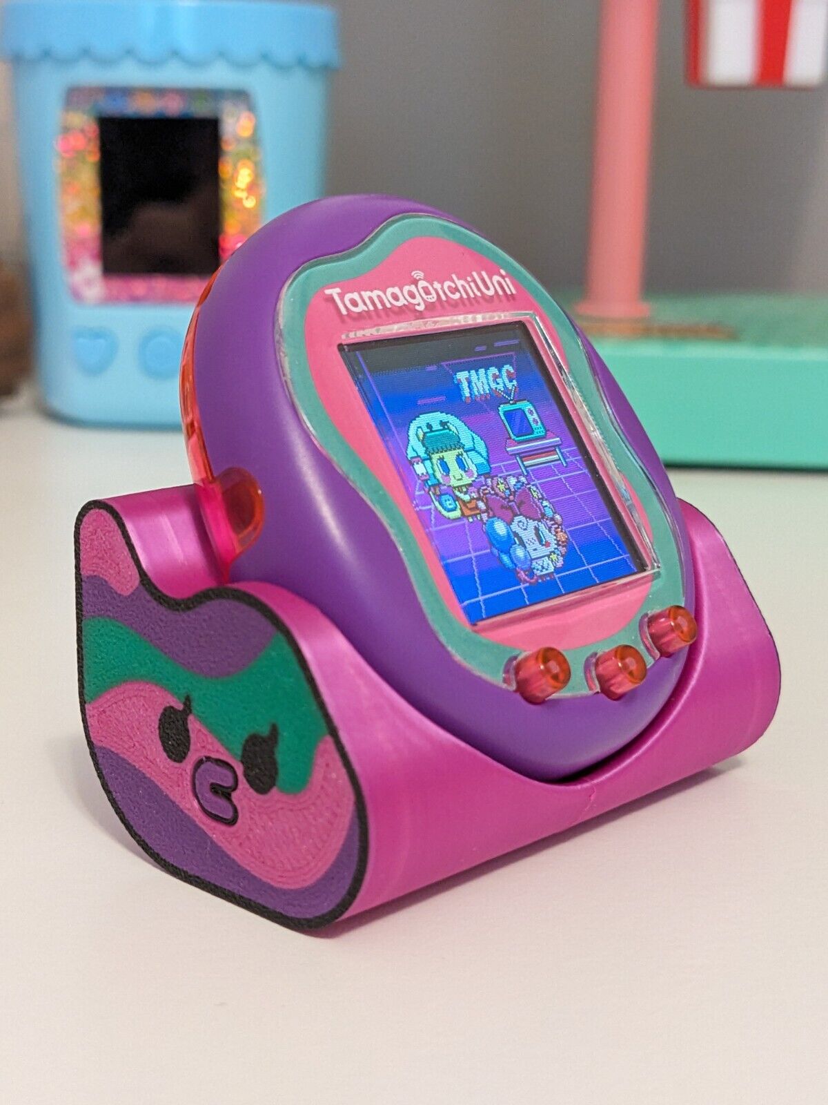 Tamagotchi Uni Stand / Cradle (Shiny Magenta)