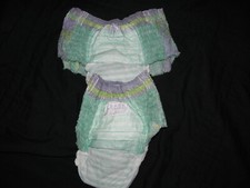 4 Pampers Ninjamas Large 64-95 Lbs made to fit 32 in waist easy.