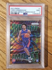 2021-22 Panini Prizm - Instant Impact Cade Cunningham #1 Green Wave Prizm (RC)