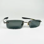 OAKLEY eyeglasses BRUSHED CHROME RIMLESS glasses frame MOD: EVADE 22-174