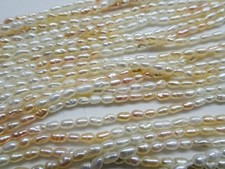 15" Strand Natural Freshwater Pearls Rice White Peach 2.5-4mm Long 64 DNG