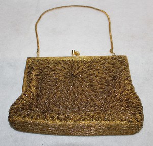 golden hand purse