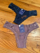 Pair Of Rosa Junio Lacy Thong Panties NWT Size Small Blue And Purple