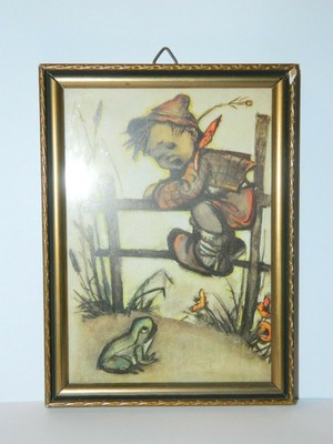 hummel boy on fence with frog