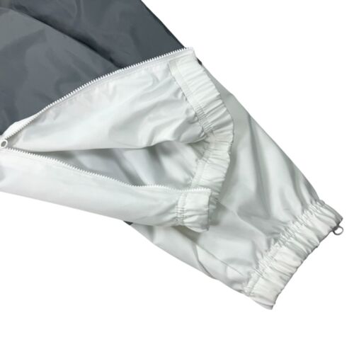 Pantalones de chándal Nike Windrunner tejidos forrados para hombre talla M, L, XL, XXL gris humo/blanco nuevos con etiquetas - Imagen 6 de 10