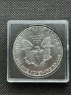 1987 SILVER EAGLE DOLLAR BULLION COIN IN UNCIRCULATED CONDITION (FOUR AVAILABLE)