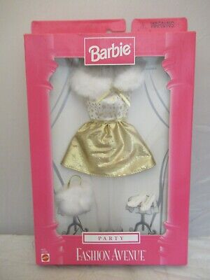 Roupa Barbie Fashion Avenue Casaco Dourado e Calça de Oncinha