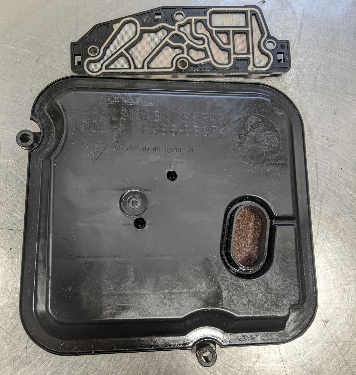 JEEP LIBERTY OEM TRANSMISSION FILTER SCREEN 52852913AB VALVE BODY