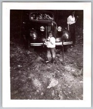 Vtg B&W Snapshot Girl Drinking Bottle Front Of Vintage Car Outdoors 1940s