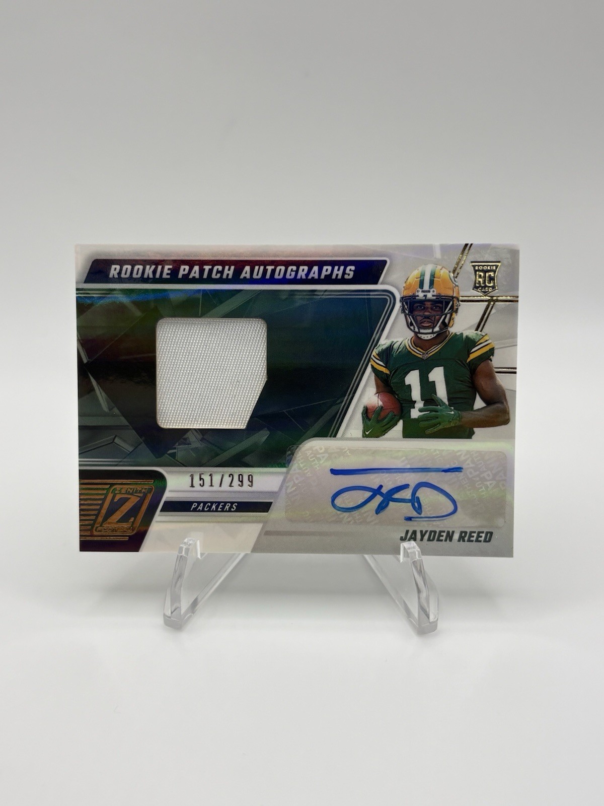 2023 Panini Zenith - Rookie Patch Autographs Jayden Reed #218 /299 (AU, MEM, RC)