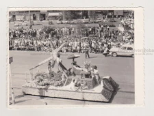 Unusual Carnival Parade Spectators Gaze Curiously Crowds Fill the Streets Photo