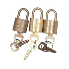 Authentic Louis Vuitton Gold Padlock with Keys