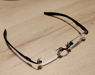Oakley Evade 22-174 Titanium Brushed Chrome Rimless Eyeglasses Frames 53-18 133