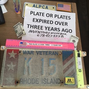 RHODE ISLAND WAR VETERAN LICENSE PLATE. SALE HELPS TUNNELTO TOWERS. Vintage