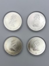 4 Encased 1976 Canadian Montreal Olympics Silver Coins