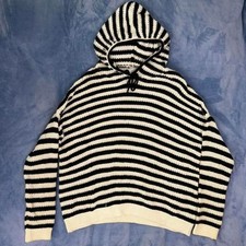 Black and white striped hoodie with a cozy feel. Size: L