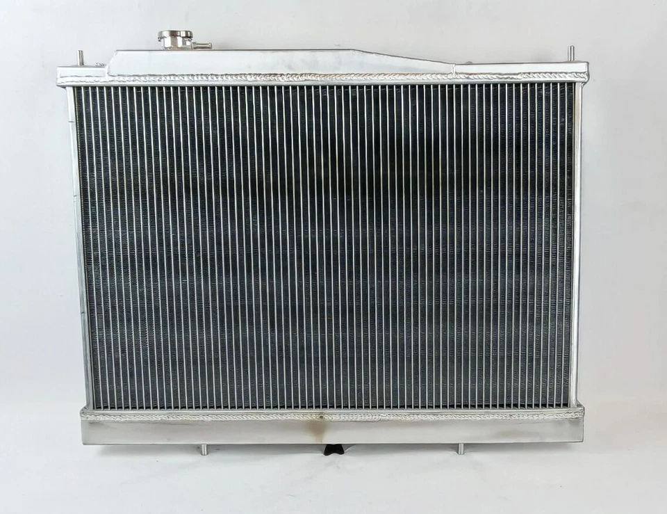 Radiador de aluminio para Nissan 2000-2004 Xterra 1998-2015 Frontier 2,4 L 3,3 L automático Foto 3 de 4
