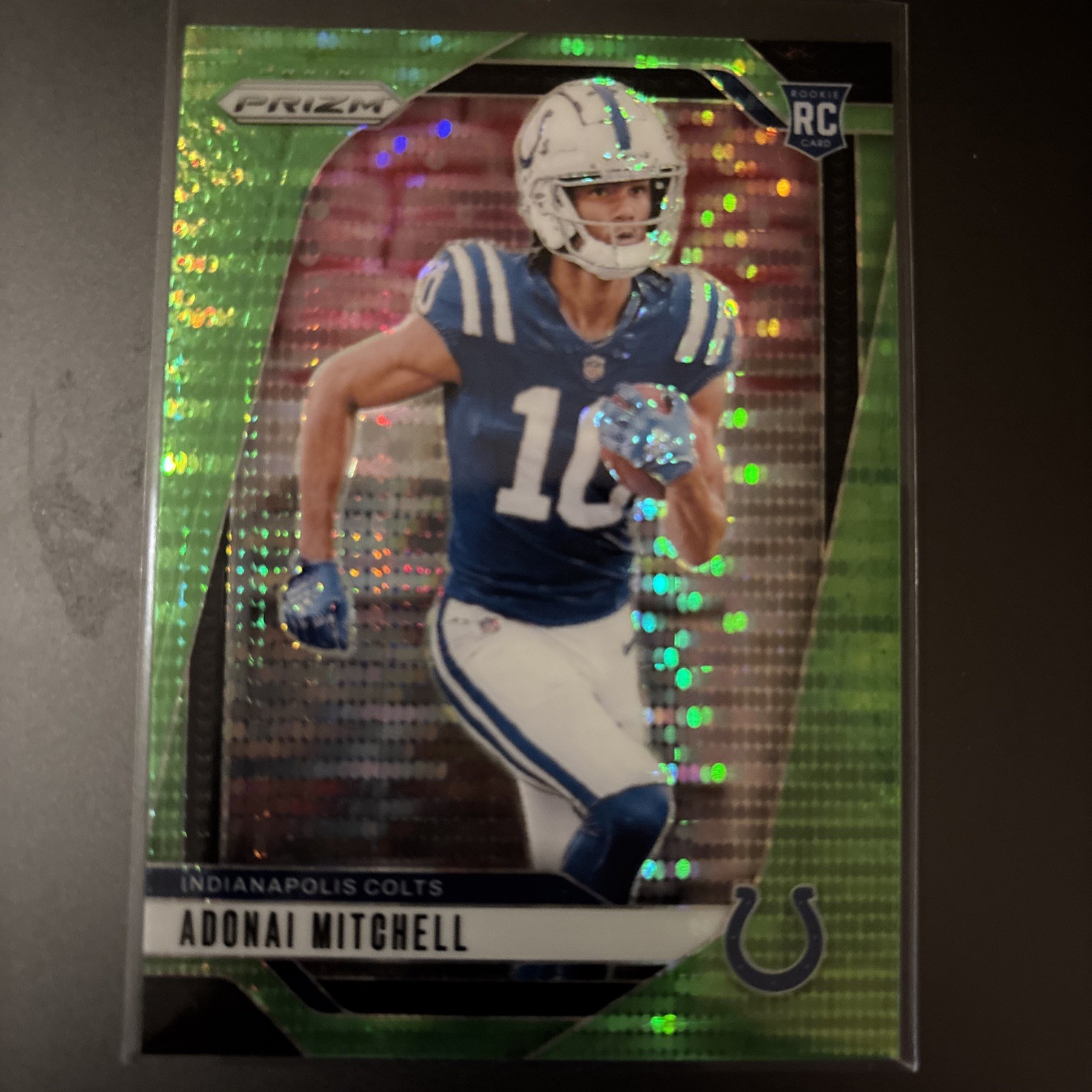 2024 Panini Prizm - Rookies Adonai Mitchell #303 Neon Green Pulsar Prizm (RC)