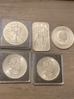 5 one ounce silver pieces