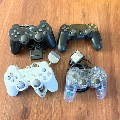 Sony PlayStation Black Wireless & Regular Controllers set of 4 Not Tested