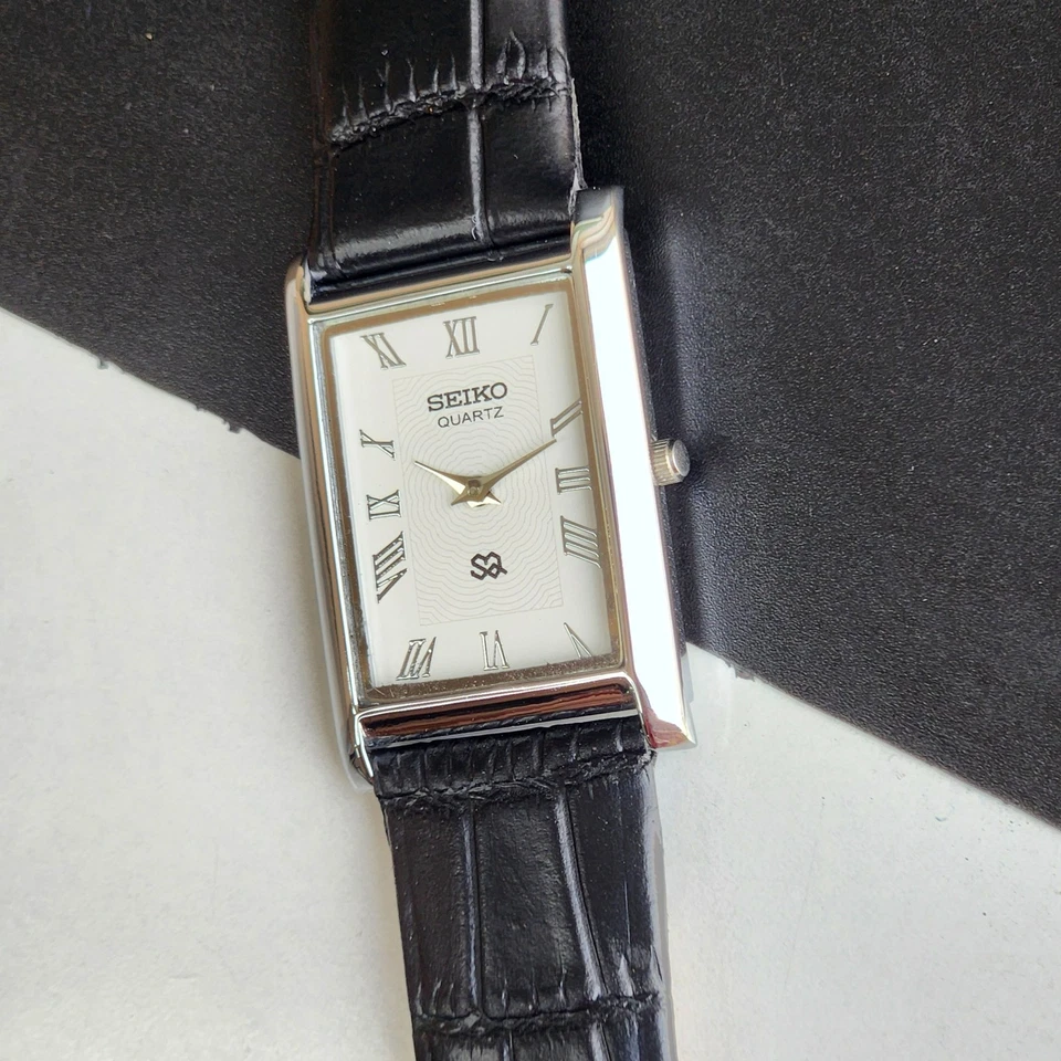 vintage Seiko Slim Tank Quartz Men White Dial Black Strap Dress Watch UK53 - image 4 of 4