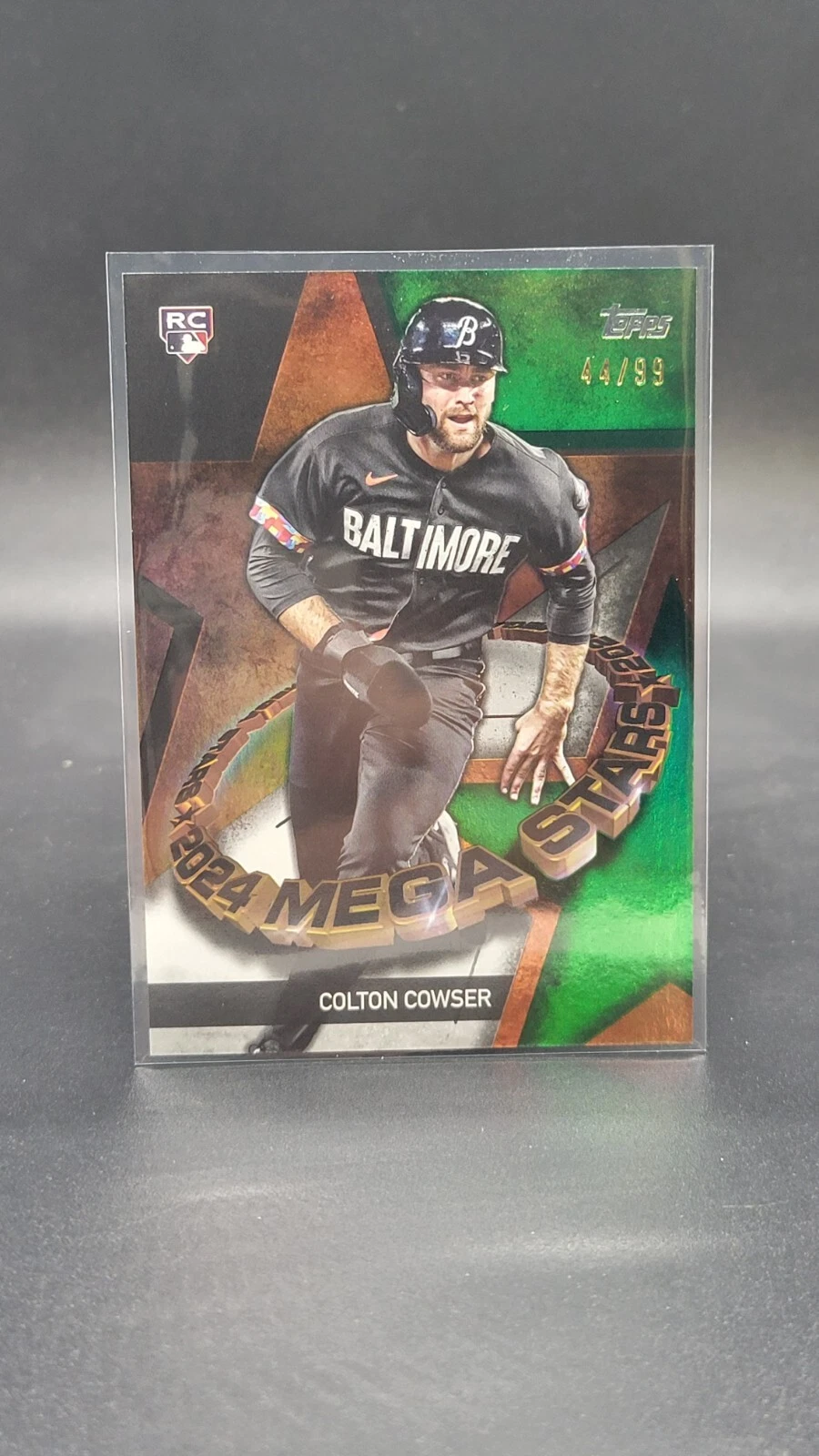 2024 Topps Series 1 Colton Cowser RC Mega Star Green Foil /99 #TMS-20