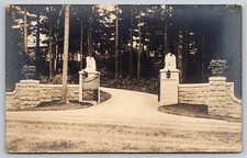 Postcard RPPC Gateway Gated Entrance Eagles on Pillars 28G