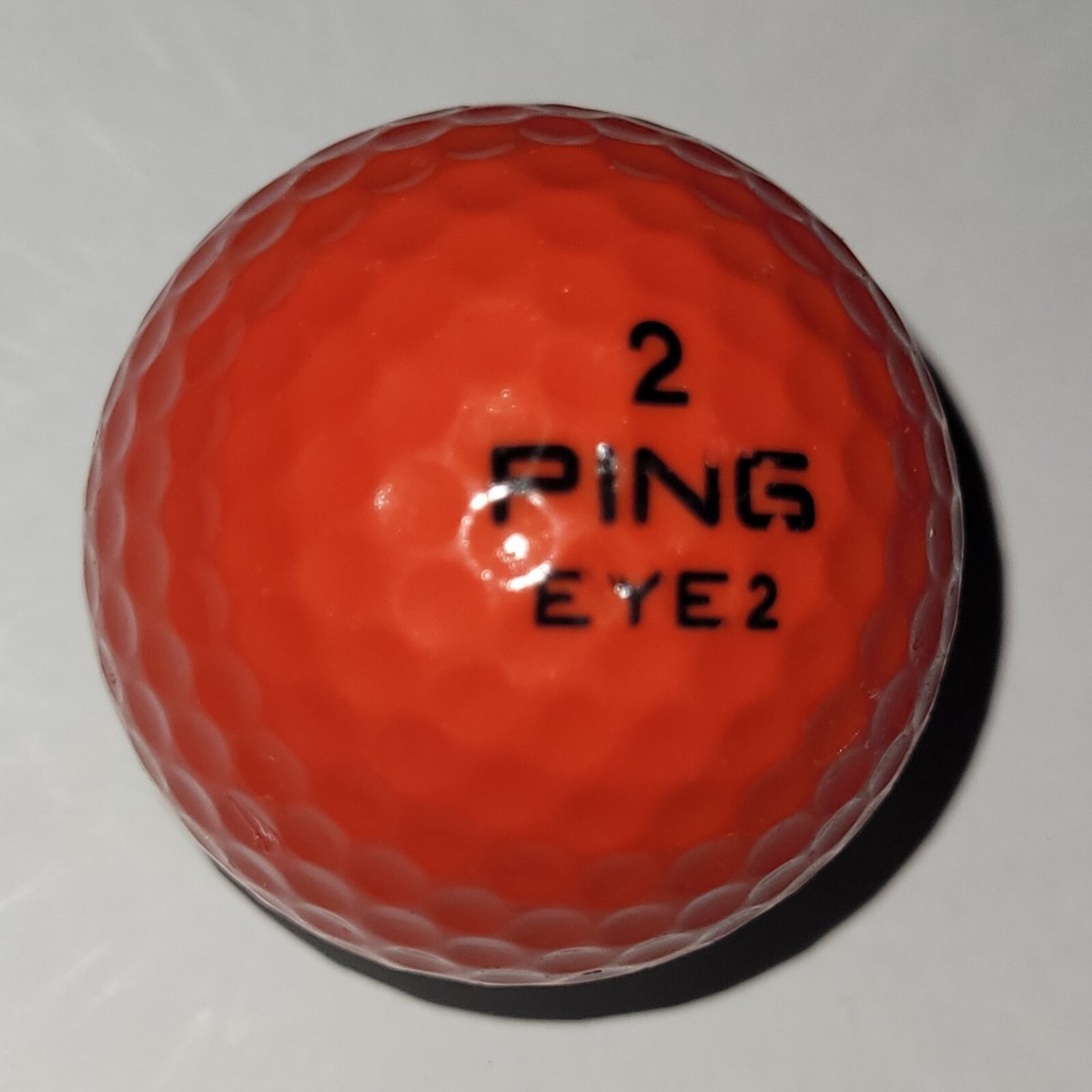 Ping Karsten Eye Red White Merry Christmas Wreath Logo 2