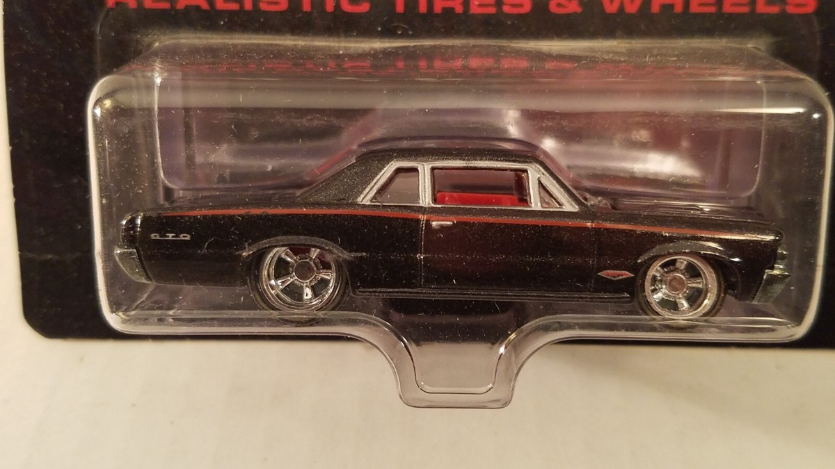 2006 Hot Wheels Ultra Hots '64 Pontiac GTO in black with red, real