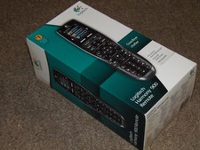 New Sealed Logitech Harmony 900 Remote Control W/ Charging Base Accessories