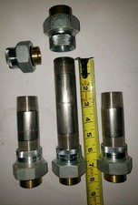 LOTE DE (5) UNIONES DIELÉCTRICAS (4) 1" y (1) 3/4" más (7) pezones de acero inoxidable