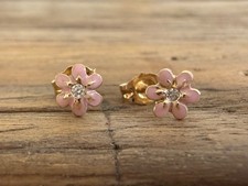14k yellow gold tiny pink enamel flower stud earrings with clear stone in middle