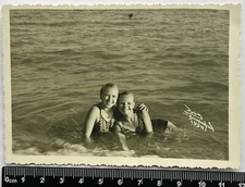 Two Young Beautiful Girls In Bikini Swimwear On The Beach Long Legs Old Photo