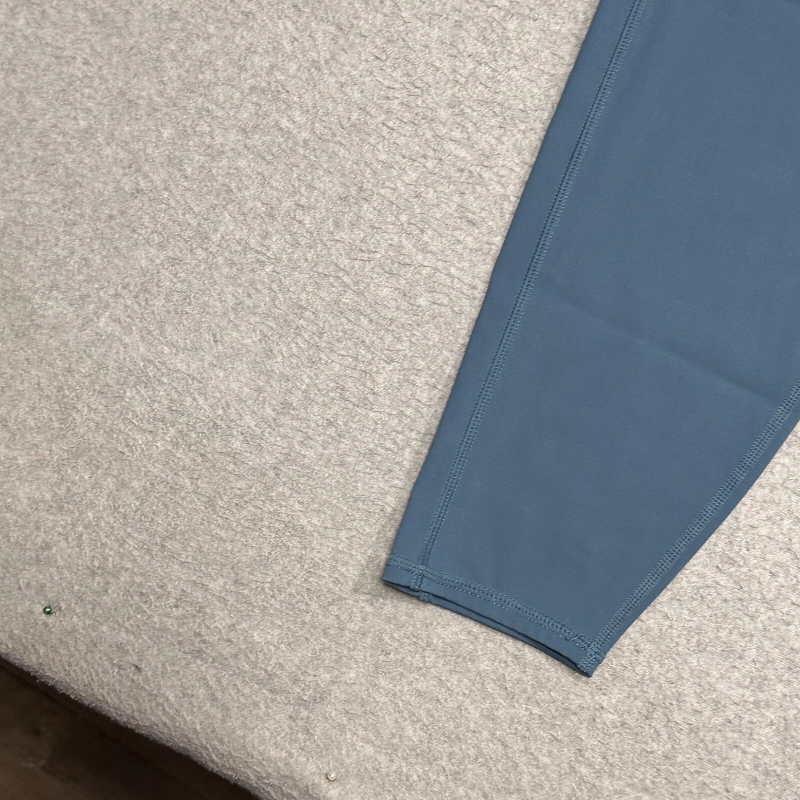 vuori pace stretch yoga run gym back pocket leggings