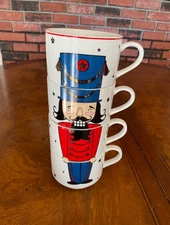The Cellar Holiday Cheer Nutcracker Stackable Mugs Set of 4 New without box.