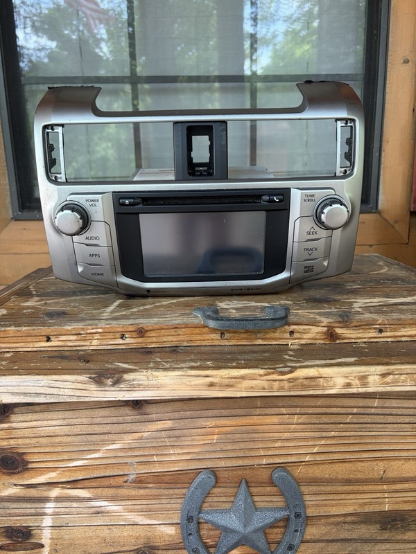 This is a Toyota 4Runner OEM navigation radio display and receiver assembly.