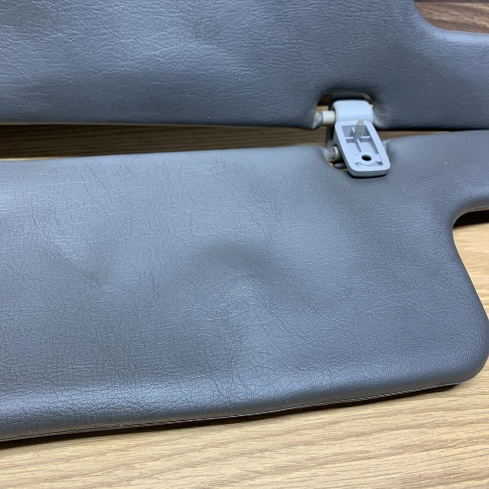 86-93 MAZDA B2200 B2600 PARASOLES PAR GRIS OEM con herrajes Foto 3 de 4