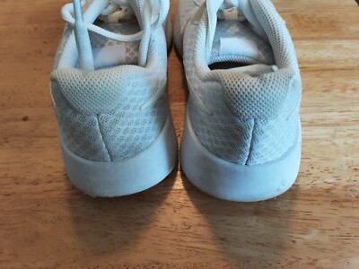 nike tanjun girls trainers white