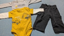 Infant Boys Size 12 months 2 shirts and a pair of pants