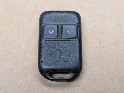 OEM MITSUBISHI DSM ECLIPSE REMOTE KEYLESS ENTRY FOB 2 BUTTONS GOH-M24 ~RARE
