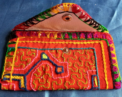 Peruvian purse hand embroidered with thread and natural leather