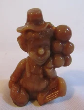 MOSSER GLASS CLOWN HOLDING BALOONS  MAXI CARMEL BROWN SLAG