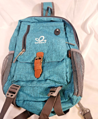 WATERFLY Small Crossbody Sling Bag: RFID Blocking Anti Theft Sling Backpack TEAL